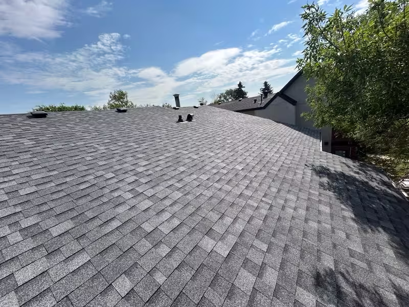 Professional asphalt roof installation completed by Peakline Roofing & Exteriors