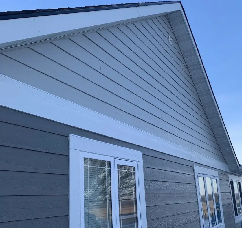 Vinyl siding completion in Calgary by Peakline Roofing