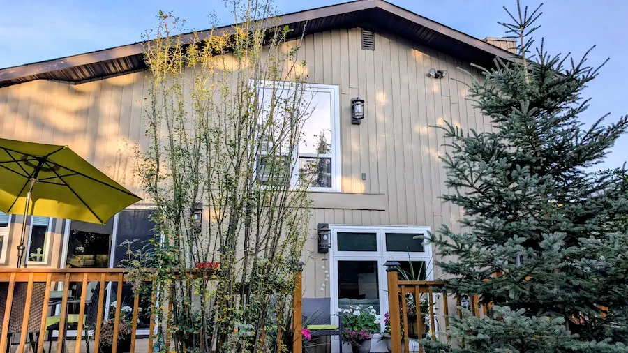 Premium Douglas Fir Siding Install by Peakline Roofing & Exteriors showcasing natural wood beauty and expert installation techniques in Calgary